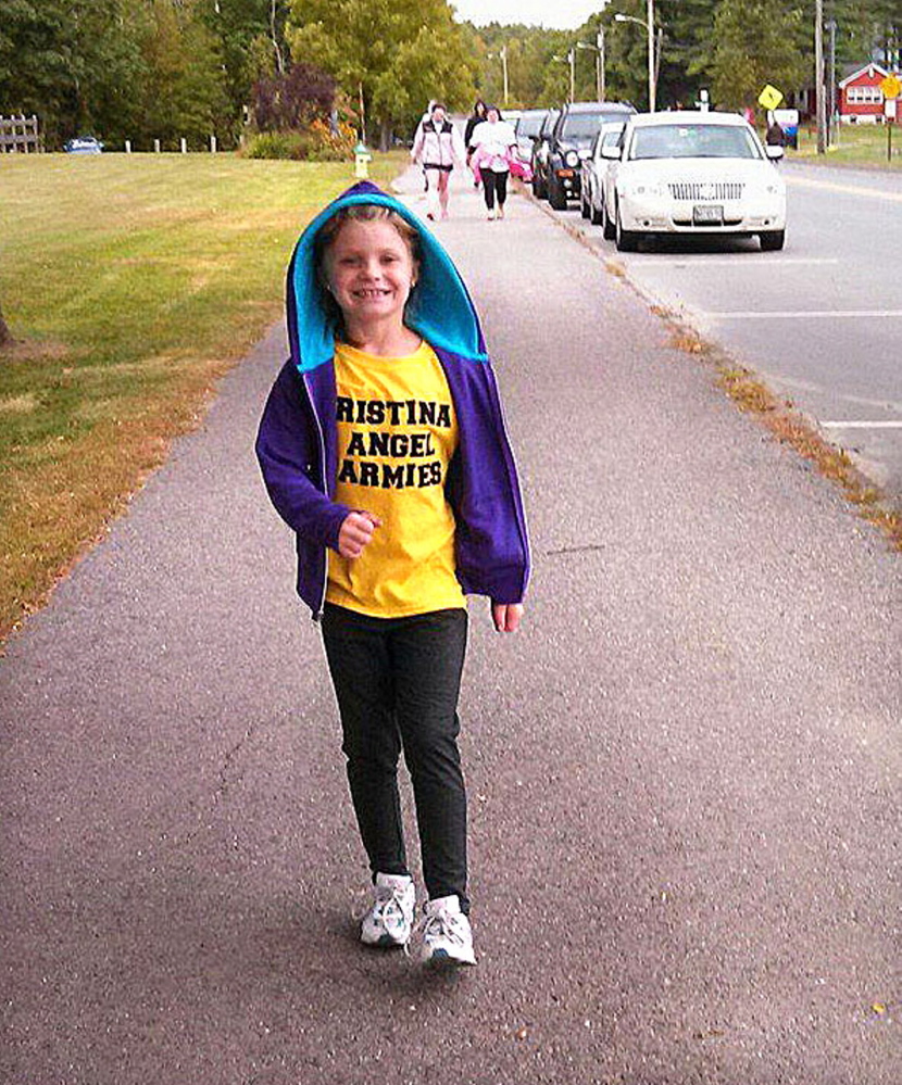 Cancer survivor Kristina Judkins walked Saturday in Waterville to raise money for children’s cancer research.