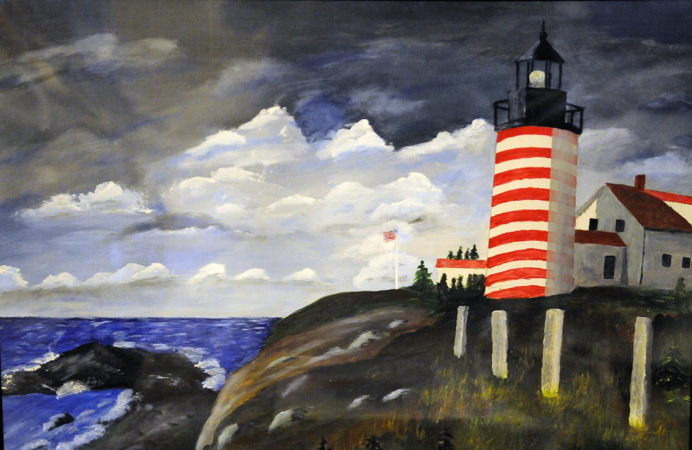 A painting of West Quoddy Head lighthouse by Ernest DeRaps of Richmond is on display in the studio of his home along with 64 other lighthouse paintings.