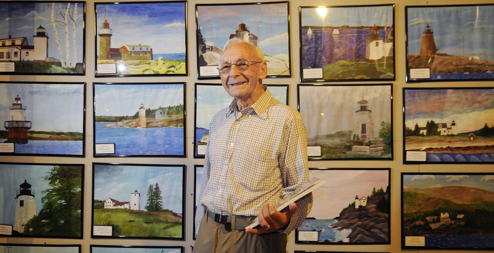 Ernest DeRaps of Richmond has painted 65 lighthouses in Maine and has all the paintings displayed in the studio of his home.
