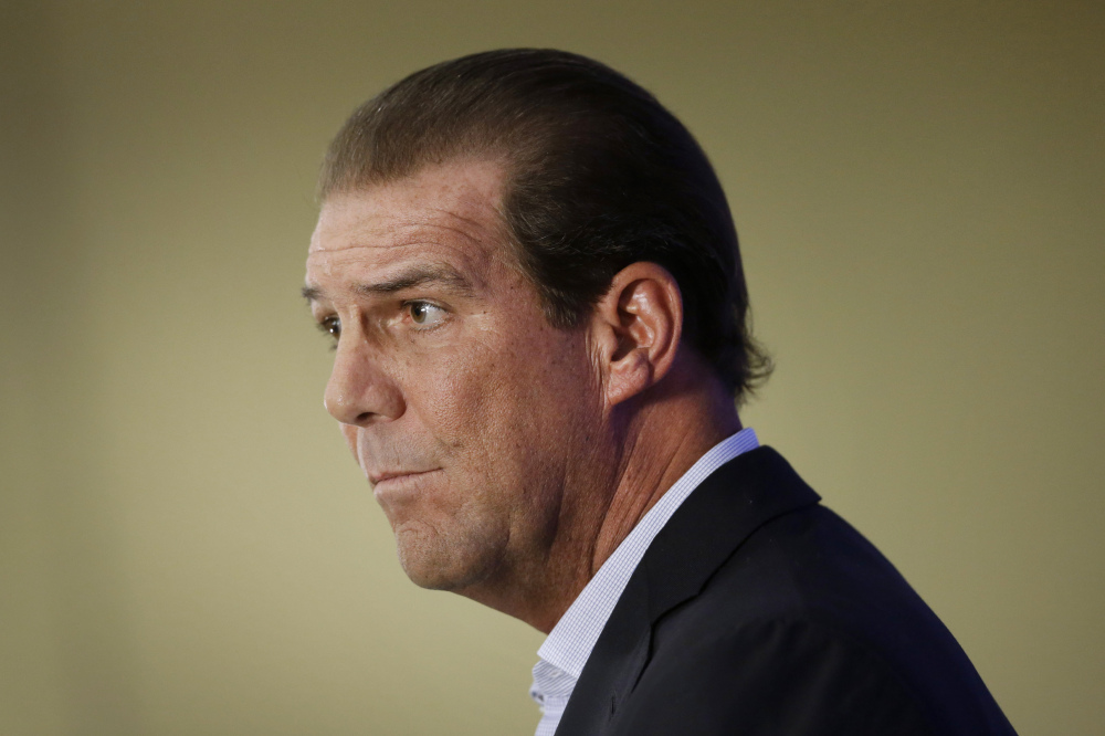 Baltimore Ravens owner Steve Bisciotti addresses the controversy surrounding former running back Ray Rice at a news conference Monday in Owings Mills, Md.