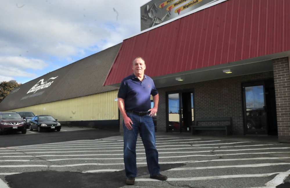Charlie Giguere stands outside Champions Fitness Center in Waterville on Monday. Giguere will continue to manage the tennis and exercise center after reaching a deal with the building owner for improvements that will allow the 30-year-old iconic local business to continue operating.
