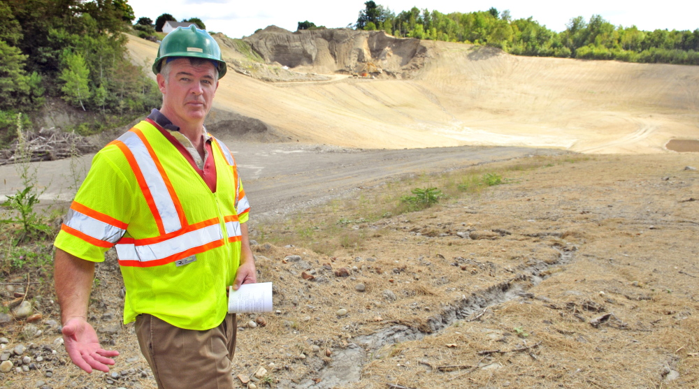 Brian Tarbuck, general manager of the Greater Augusta Utility District, leads a tour of a former gravel pit that is the district’s new east side well complex off Riverside Drive in Augusta.