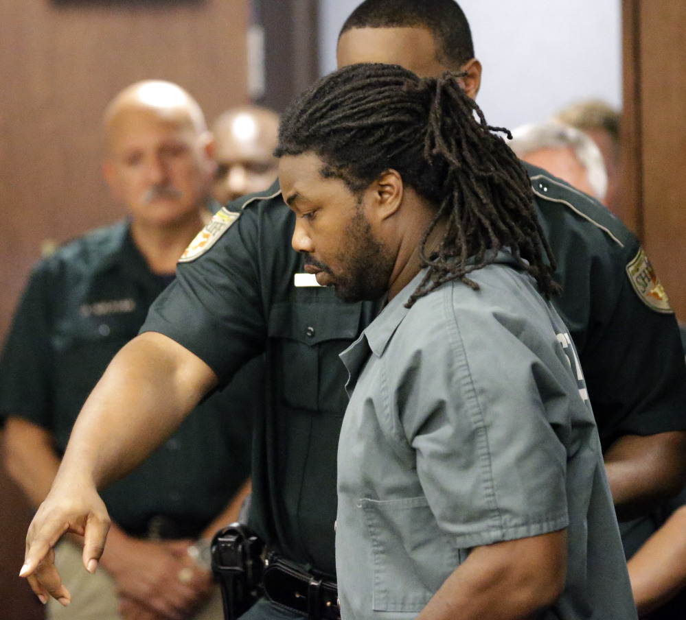 The Associated Press Jesse Leroy Matthew Jr. is escorted into a courtroom in Galveston, Texas, on Thursday for an appearance regarding his extradition back to Virginia. Matthew was arrested on a beach in the Texas community of Gilchrist on Wednesday night, charged with abducting University of Virginia sophomore Hannah Graham. He waived extradition as Virginia authorities arrived to take him back.