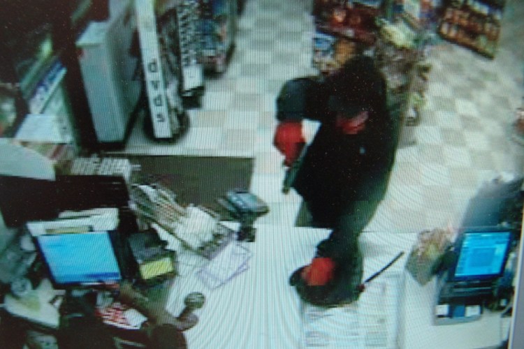 Surveillance footage of alleged robber.