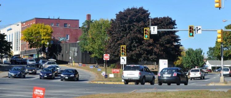 Traffic moves through the intersection of Spring, Water and Main streets in downtown Waterville.