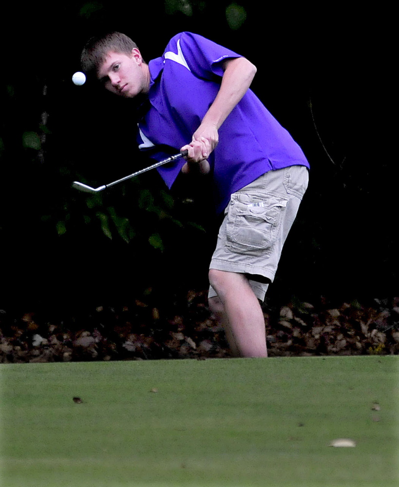 Waterville’s C.J. Gaunce competes against Maine Central Institute at the J.W. Parks course in Pittsfield on Monday.