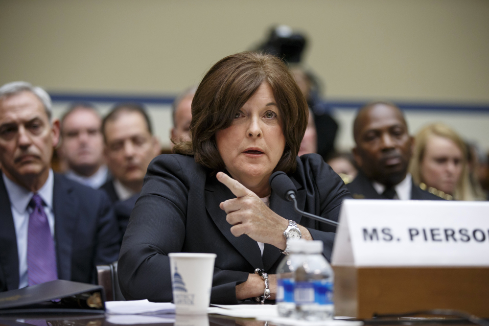 Secret Service Director Julia Pierson testifies on Capitol Hill in Washington, Tuesday, Sept. 30, 2014, before the House Oversight Committee as it examines details surrounding a security breach at the White House when a man climbed over a fence, sprinted across the north lawn and dash deep into the executive mansion before finally being subdued.  (AP Photo/J. Scott Applewhite)
