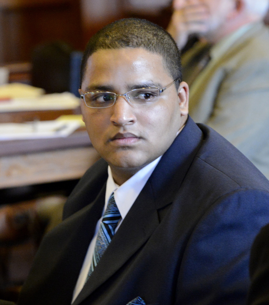 Anthony Pratt Jr. listens Monday during opening statements at his murder trial at the Cumberland County Court House in Portland.