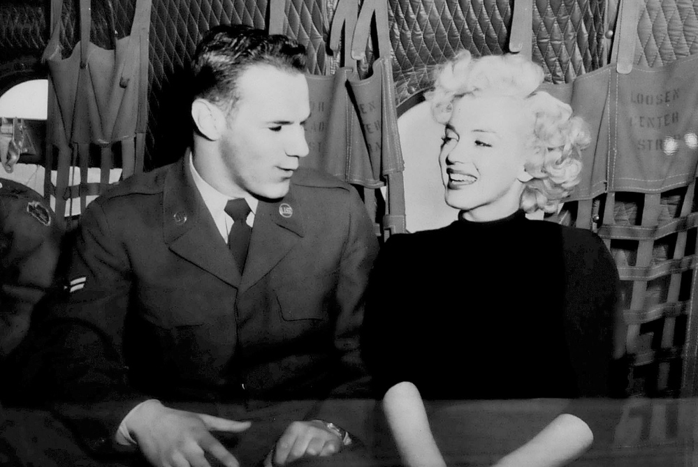 Galen Leavitt took this photo of himself with Marilyn Monroe during a Korean War USO show. It is on exhibit at the Oakland Library beginning Wednesday.