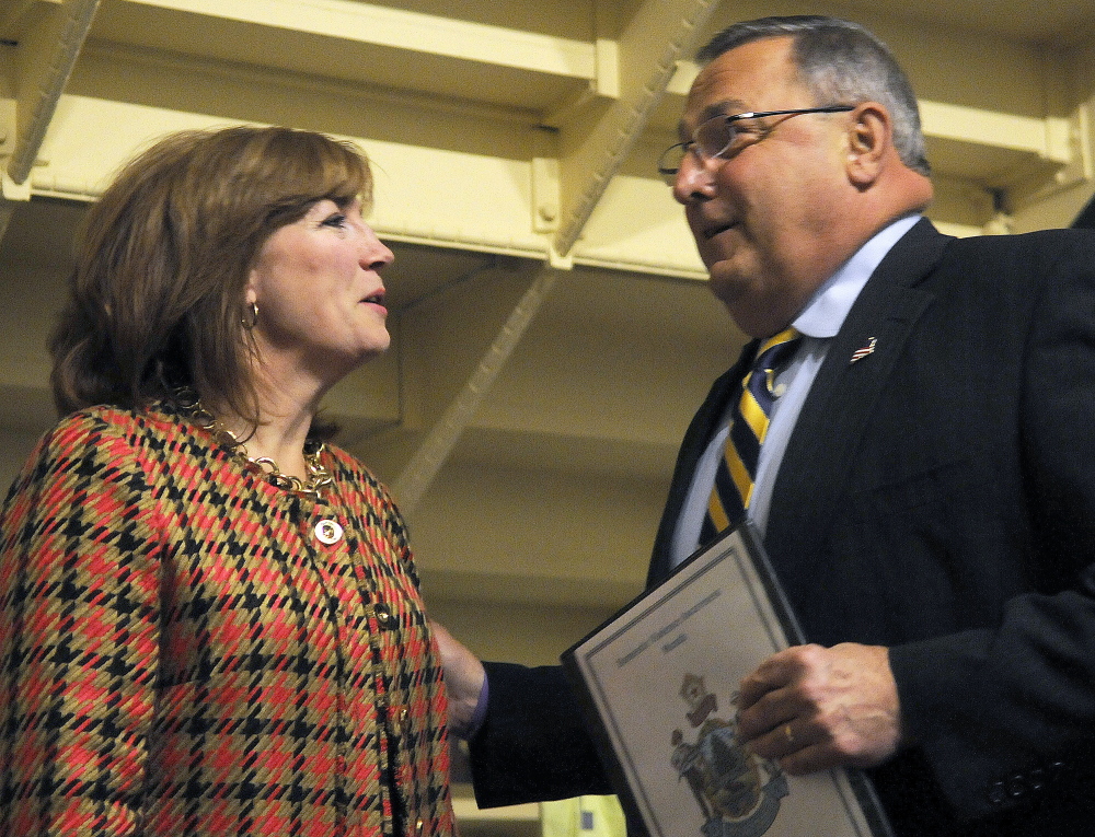 Susan Dench speaks on Tuesday with Gov. Paul LePage at his office in Augusta as the Senate considers her nomination to the University of Maine System board of trustees. The Senate failed to meet the two-thirds threshold needed to override the Education Committee’s recommendation to reject Dench.