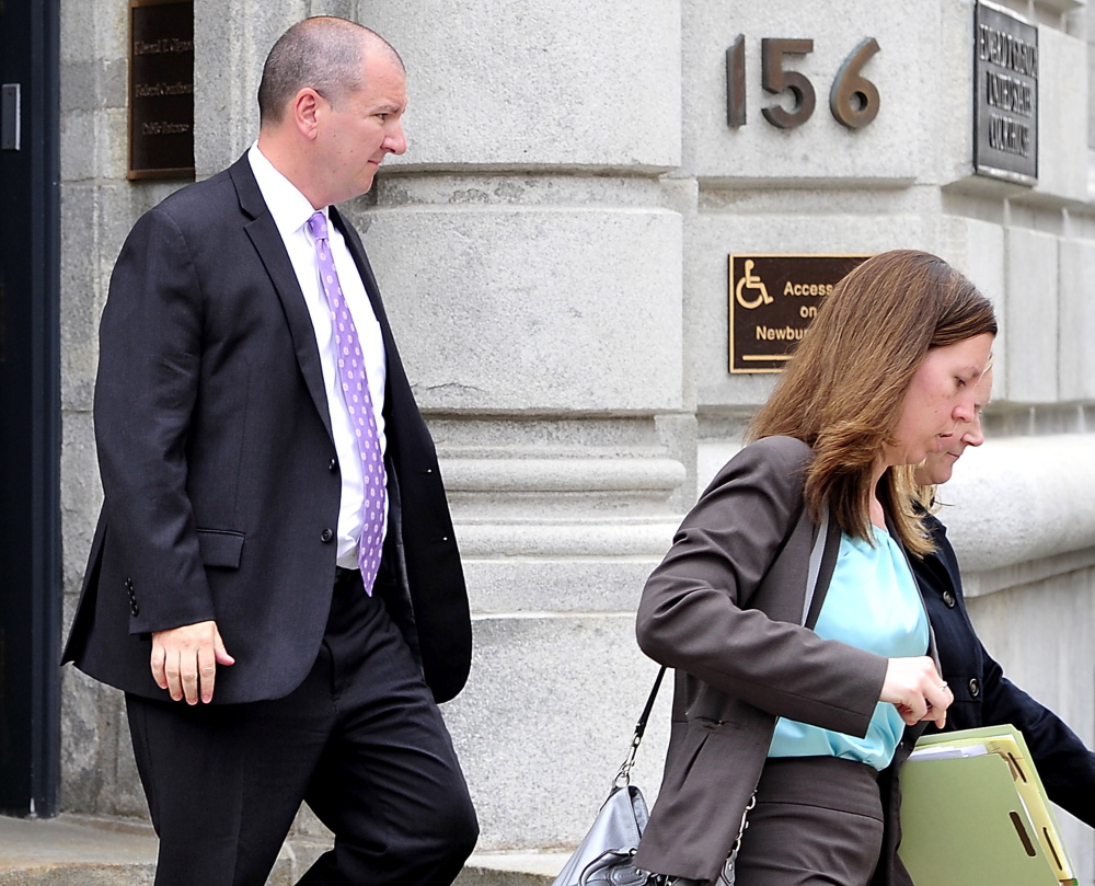 Jeffrey Burnham leaves U.S. District Court in May with his lawyer, Sarah Churchill, after being charged with felony theft. He pleaded guilty in June and was sentenced Wednesday.