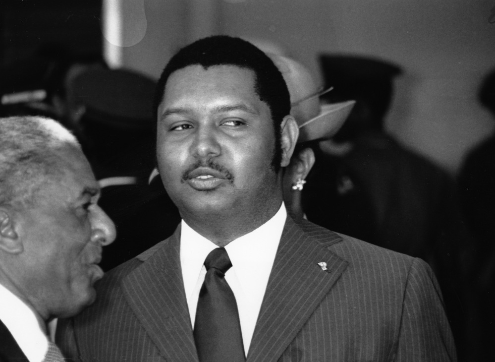 In this April 25, 1975 file phot, Haitian President Jean-Claude Duvalier welcomes Zambian President Kenneth Kaunda at the Port-au-Prince airport in Haiti.