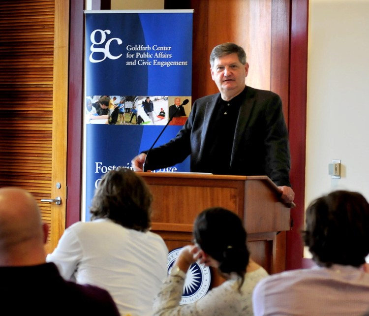 New York Times investigative reporter James Risen speaks with journalism students on Sunday at Colby College in Waterville. Risen is this years recipient of the Elijah Parish Lovejoy award for journalism.