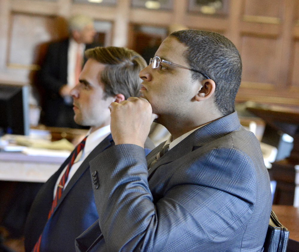 Anthony Pratt Jr., right, listens with one of his attorneys, Dylan Boyd, during closing arguments in his murder trial at the Cumberland County Courthouse in Portland on Wednesday.