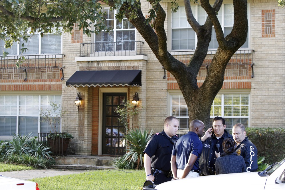 First responders guard the apartment of a healthcare worker Sunday, Oct. 12, 2014, in Dallas. The healthcare worker, who was caring for Ebola patient Thomas Eric Duncan, tested positive for the disease in preliminary tests. If the preliminary diagnosis is confirmed, it would be the first known case of the disease being contracted or transmitted in the U.S.   (AP Photo/Brandon Wade)