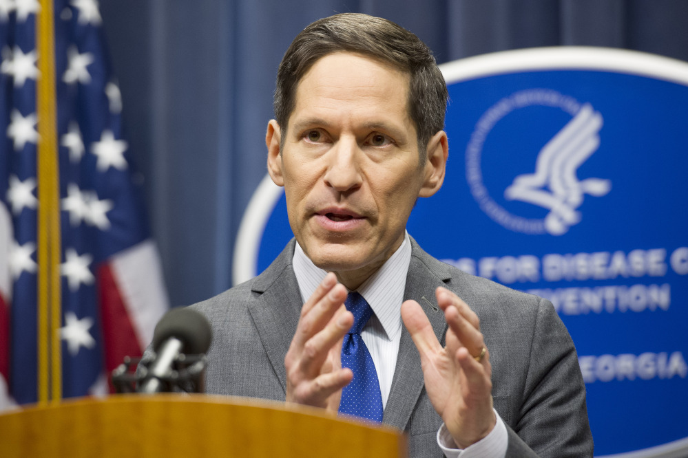 Dr. Tom Frieden, head of the Centers for Disease Control and Prevention, speaks at a news conference, Sunday Oct. 12, 2014, in Atlanta. A Texas health care worker, who was in full protective gear when providing hospital care for Ebola patient Thomas Eric Duncan, who later died, has tested positive for the virus and is in stable condition. (AP Photo/John Amis)