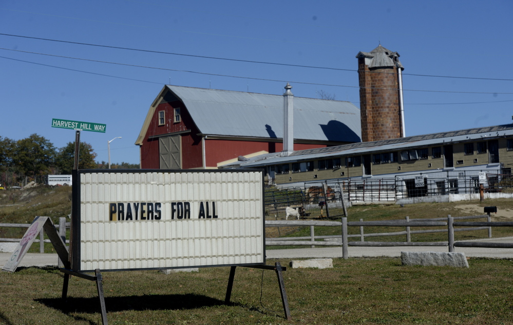 A sign at Harvest Hill Farms in the wake of the accident Saturday that killed Messalonskee High School student Cassidy Charette and injured others on a hayride.