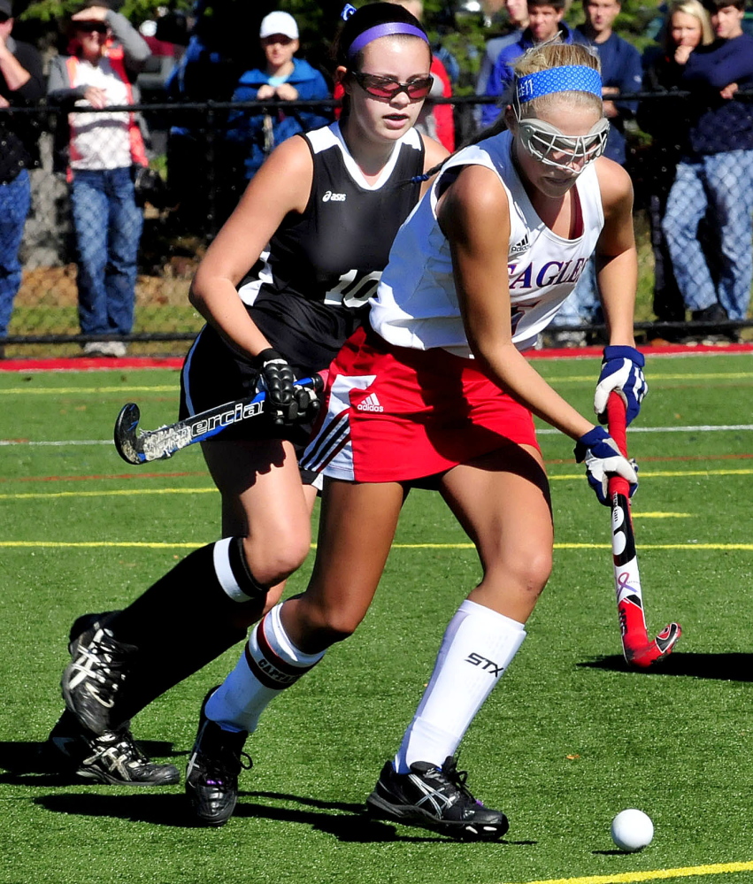 Messalonskee’s Brooke Quirion and Skowhegan’s Tori Mullin play in Waterville on Monday.