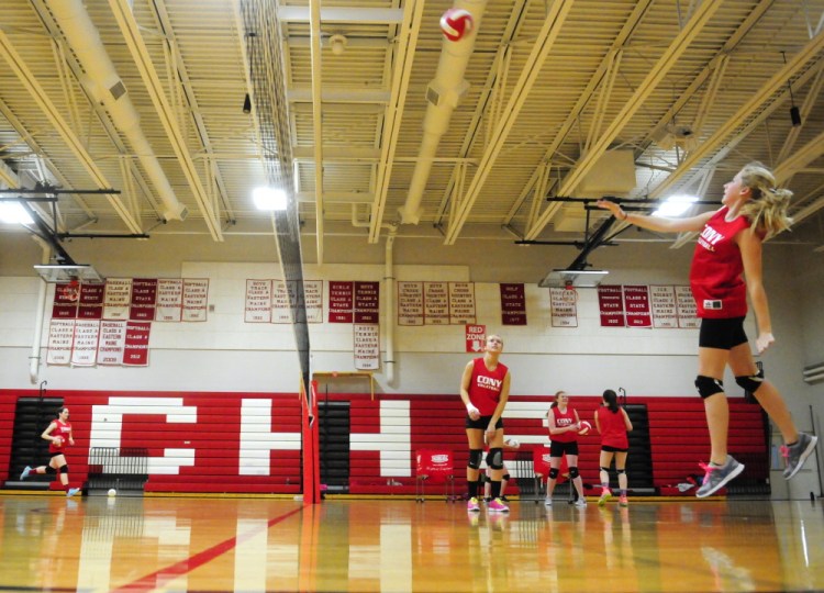 The Cony volleyball team practices drills during practice on Wednesday in the high school gym in Augusta. The team has a shot at a playoff berth with a couple of big wins to end the season.