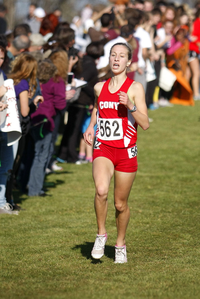 Portland Press Herald file photo by Jill BradyAnne Guadalupi of Cony approaches the finish line at the Class A girls cross country state championships last season. Guadalupi is a favorite in Saturday's Kennebec Valley Athletic Conference Class A championship meet.