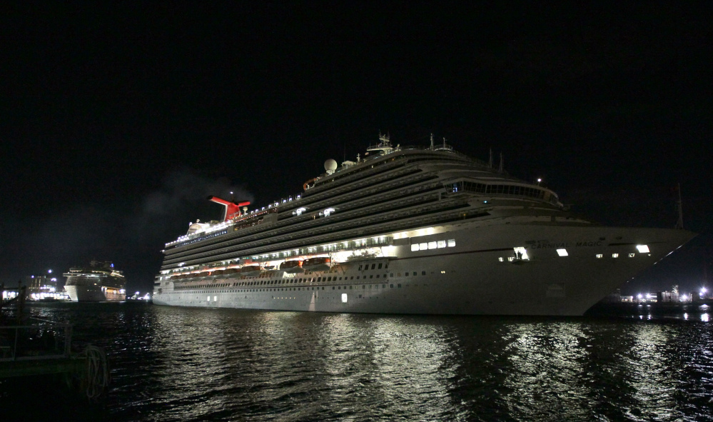 The Carnival Magic docks at Pier 25 in Galveston, Texas, early Sunday. A passenger aboard the cruise ship had been in voluntary isolation in her cabin because of potential contact with the Ebola virus. The woman works as a lab technician at Dallas’ Presbyterian Hospital and may have come into contact with some clinical samples belonging to Thomas Eric Duncan, who died last week after contracting the disease.