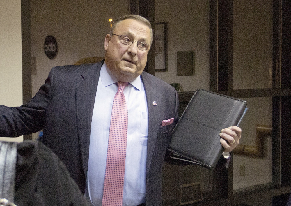 Press Herald photo by Gabe Souza 
 Gov. Paul LePage stops in the lobby of WMTW television in Auburn, on Tuesday, following the last of six gubernatorial debates.