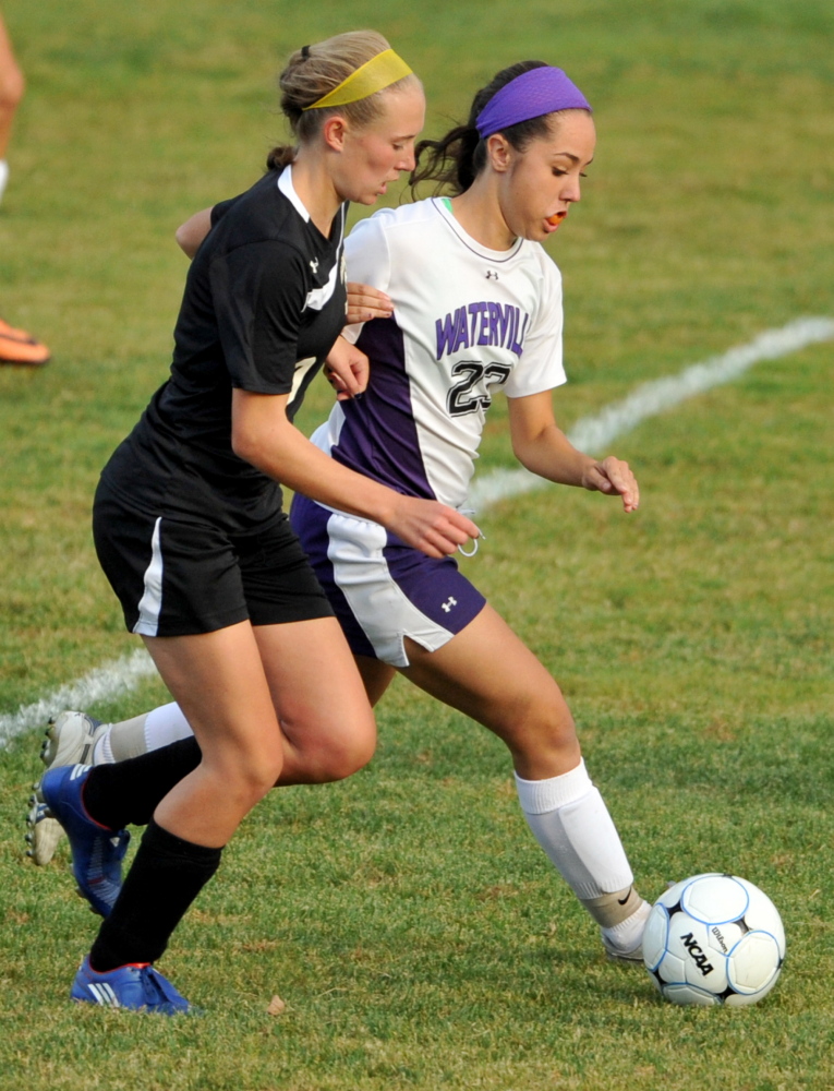 Waterville Senior High School’s Pilar Elias, right, battles for control of the ball during a game against Maranacook this season. Elias is a big reason why the Purple Panthers are gearing up for a state title run.