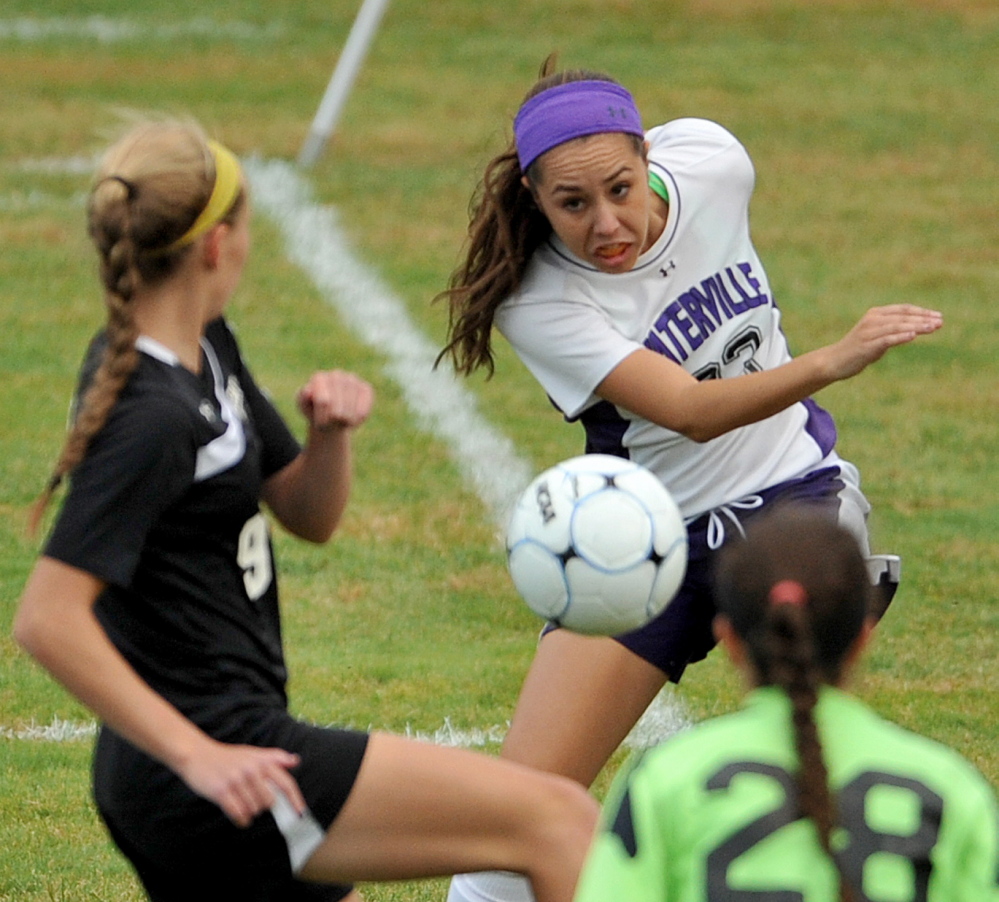 Waterville Senior High School’s Pilar Elias, right, battles for control of the ball during a game against Maranacook this season. Elias has a team-high 32 goals this fall.