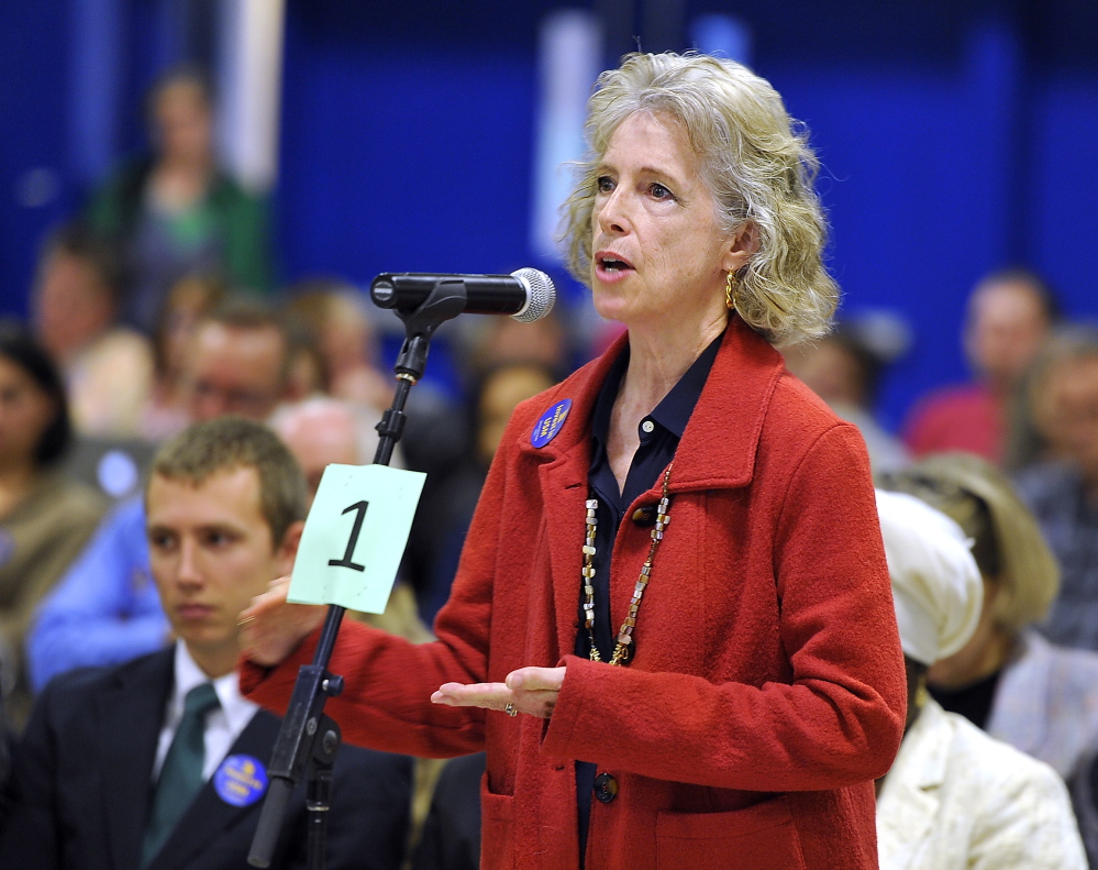 PORTLAND, ME - OCTOBER 24: Joan Gordon, president of Maine Molecular Quality Controls, pleads with the University of Maine System Board of Trustees to save the Applied Medical Sciences department from elimination as students and instructors speak before the Board of Trustees at Sullivan Gym before they vote to cut programs and staff because of budget shortfalls. (Photo by Gordon Chibroski/Staff Photographer)