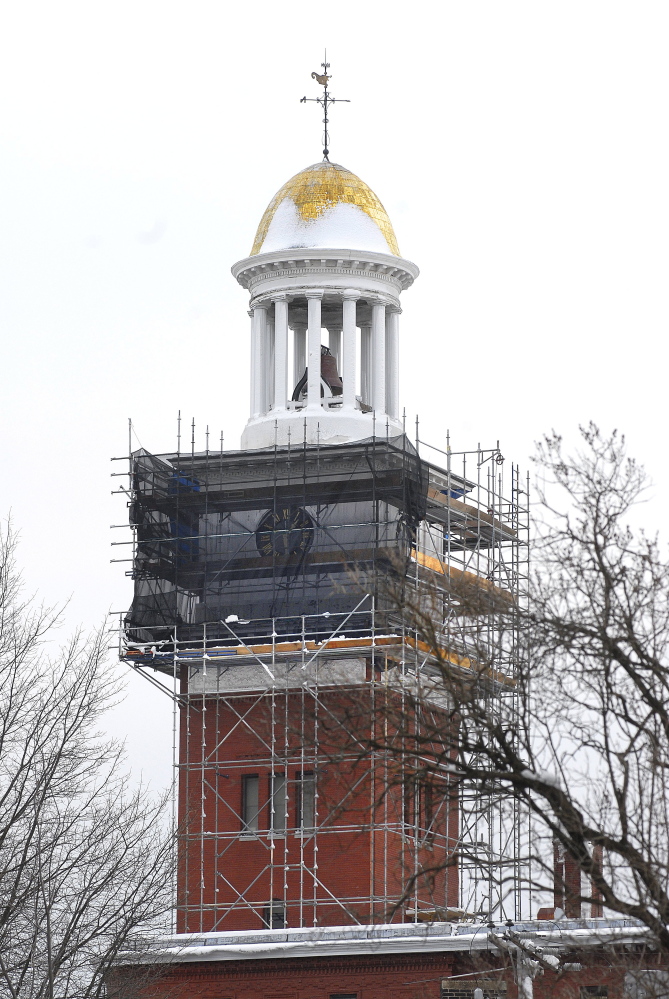 The Biddeford City Hall clock tower, surrounded by scaffolding in 2009, is now named on Maine Preservation’s “Most Endangered Properties” list.