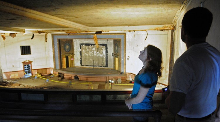 Gray Harris, of Jefferson, left, and Otis Carroll, of Newcastle, look around in the Colonial Theater balcony during a tour on July 26.