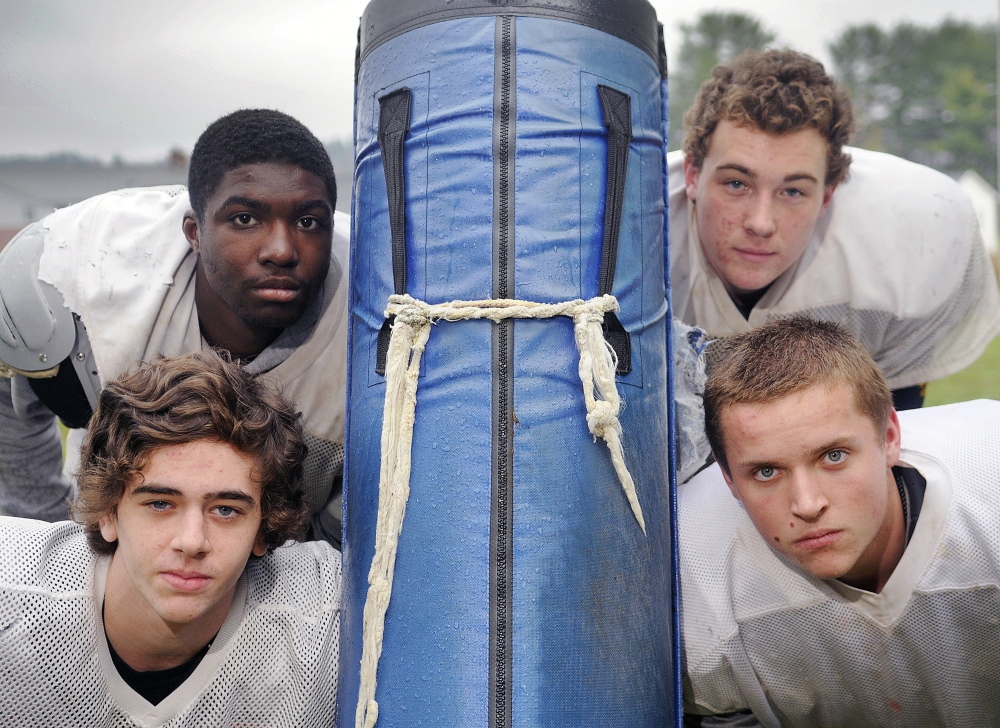 Staff photo by Andy Molloy 
 Seniors, clockwise from bottom left, Caden Brown, Josh Ehriorobo, Josh Murphy and Mike Antanavich help lead a Maranacook team that is back in the Western D Campbell Conference playoffs this fall.