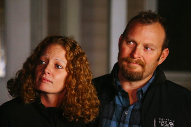 Kaci Hickox and boyfriend, Ted Wilbur, take questions about Maine's quarantine policy outside Wilbur's home in Fort Kent on Wednesday.