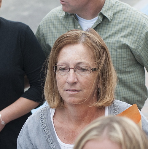 Carole J. Swan, former Chelsea selectwoman, with her younger son John Swan, as they enter the U.S. District Court building in Bangor in June for her sentencing hearing on extortion, tax fraud and workers’ compensation fraud.