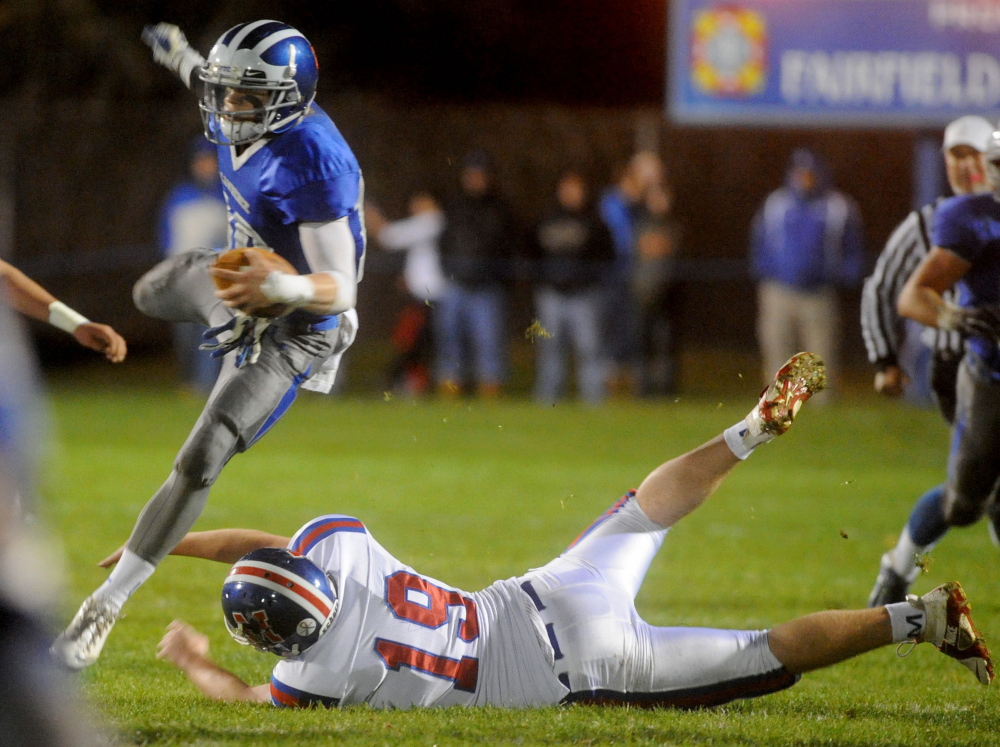 Cody Martin, left, and the Lawrence football team play Cony in the Eastern Class B semifinals Saturday at Alumni Field in Augusta. Cony beat Lawrence 30-13 in their regular season meeting back on Sept. 26.