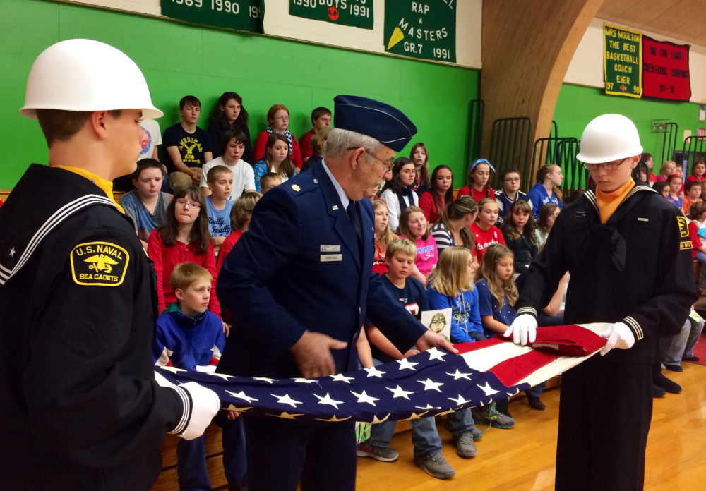 Athens school honors area veterans with patriotic songs
