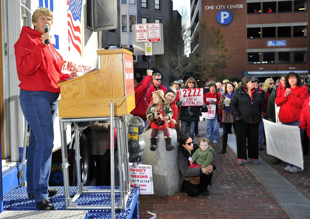 IBEW president, Diane Winton, speaks to the workers and supporters during the striking Fairpoint union workers rally at Monument Square on Saturday.