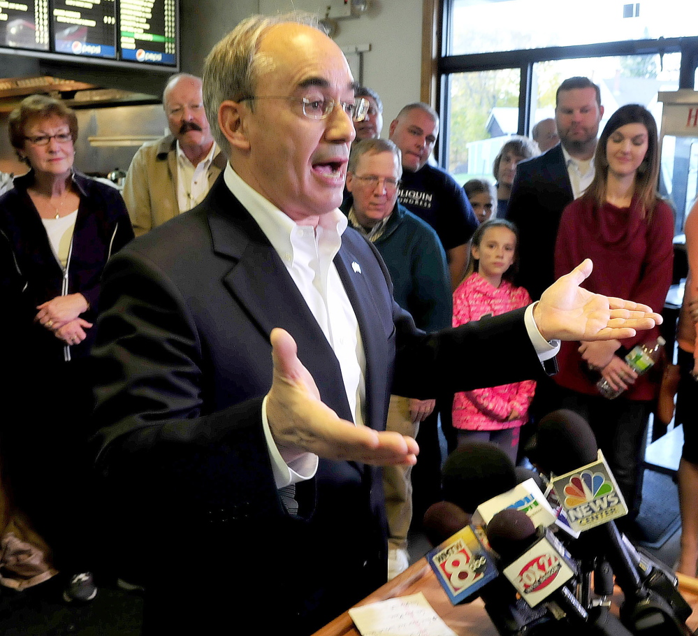 Bruce Poliquin outlines his plans Wednesday, a day after he was elected to Maine’s 2nd District Congressional seat, during a news conference in Oakland.