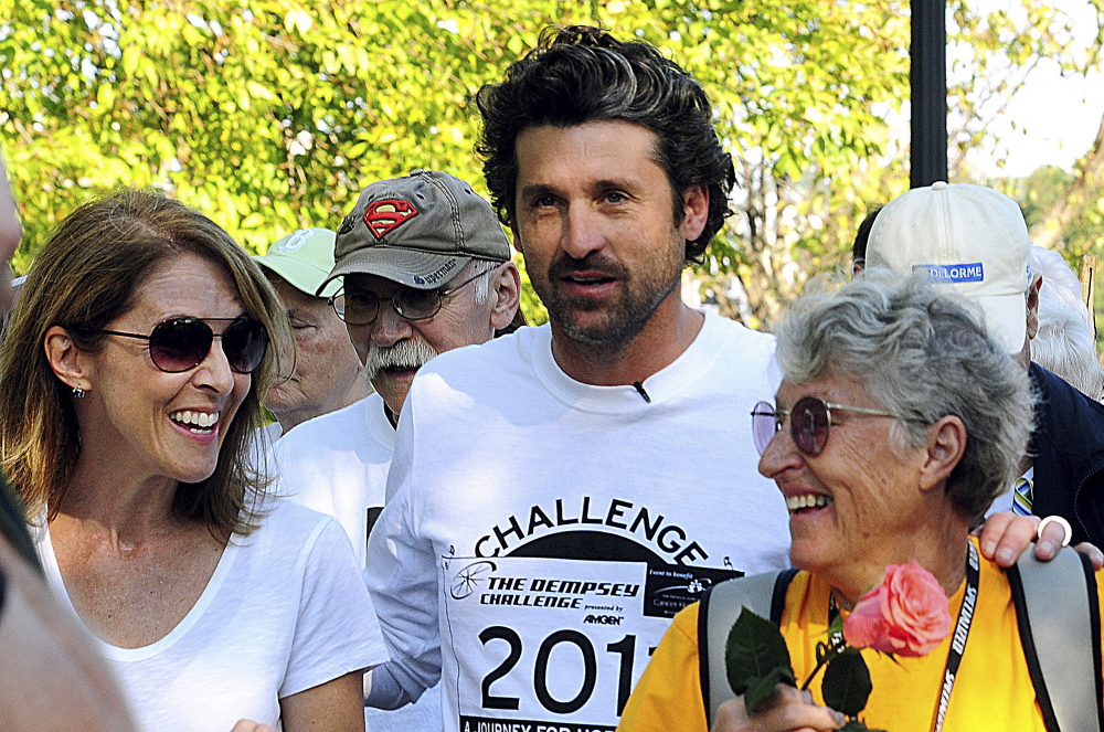 Actor Patrick Dempsey, center, prepares to start the Survivor Walk with his mother, Amanda, right, and Amgen Breakaway from Cancer Award winner Laura Davis on Oct. 8, 2011, in Lewiston on the first day of the Dempsey Challenge. The sixth Dempsey Challenge took place in September without the woman who provided the inspiration for the fundraiser and a cancer center. Amanda Dempsey died in March.