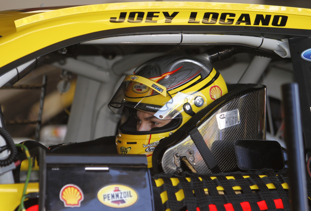 Joey Logano waits in his car to practice for the Daytona 500 earlier this season. Logano, Ryan Newman,  Kevin Harvick and Denny Hamlin have their share of tangled histories to get within reach of what will be the first NASCAR title for Sunday’s winner.