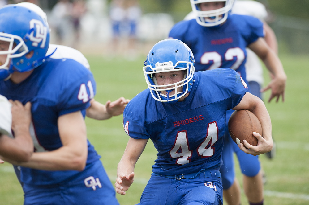 Oak Hill running back Kyle Flaherty rushes for positive yards during a Western D Campbell Conference game against Telstar earlier this season in Wales.