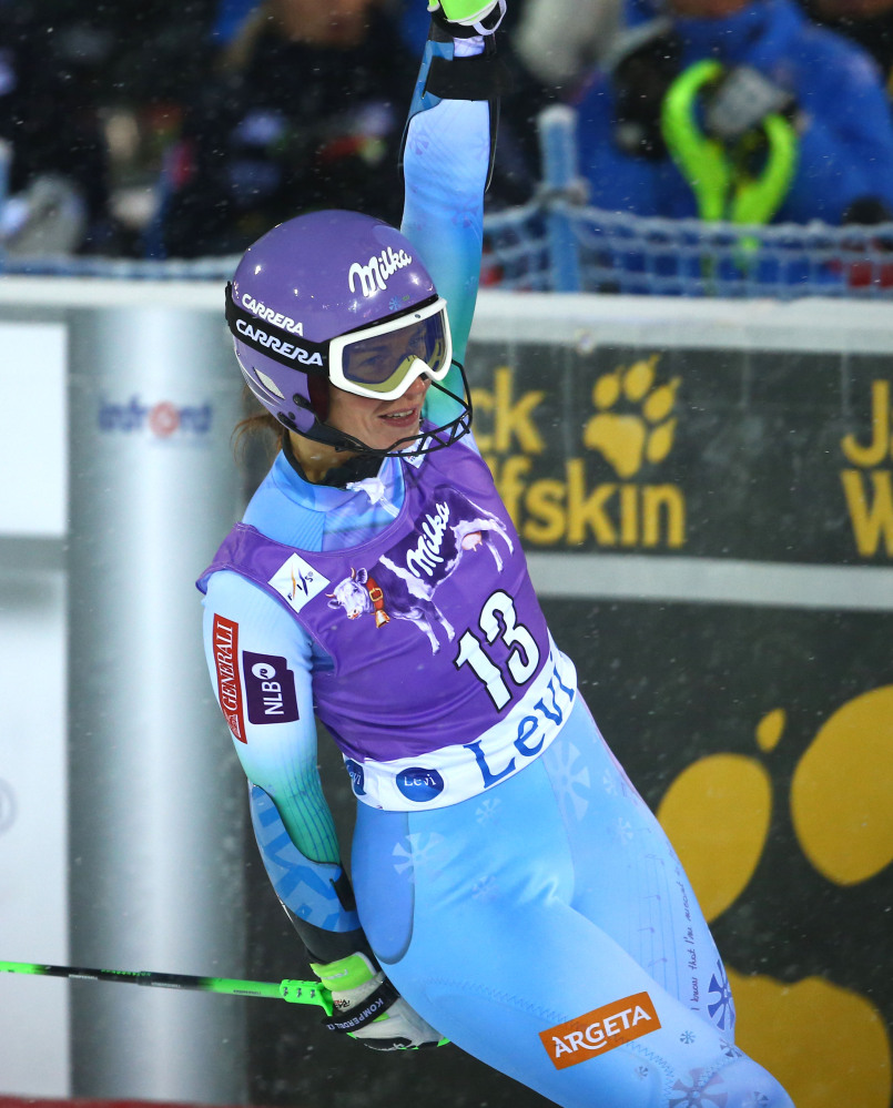 Tina Maze celebrates in the finish area after winning the World Cup slalom opener, in Levi, Finland, on Saturday.