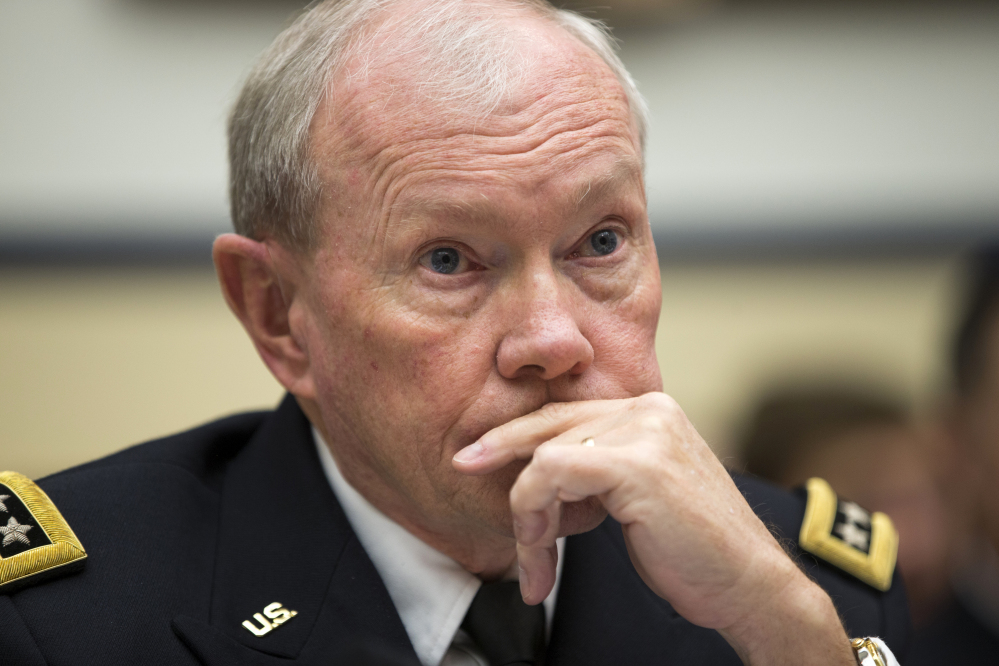 Joint Chiefs Chairman Gen. Martin Dempsey made a surprise visit to Iraq on Saturday, his first since a U.S.-led coalition began launching airstrikes against the extremist Islamic State group.