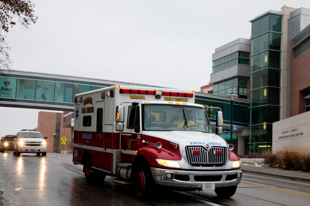 An ambulance transports Dr. Martin Salia, a surgeon working in Sierra Leone who had been diagnosed with Ebola, to the Nebraska Medical Center in Omaha, Neb., Saturday.