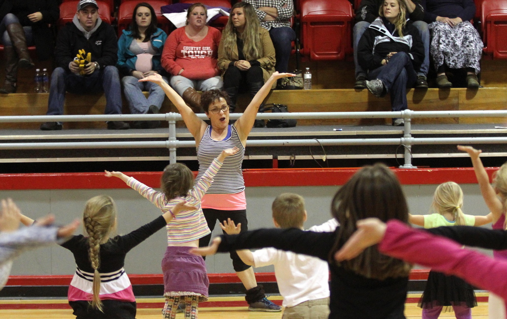 Farmington Postmaster Sue Jones leads a dance rehearsal at the Farmington Community Center on Saturday. This will mark the second year Jones has directed a show in Farmington which will take place at the Farmington Community Center on Dec. 6 at 4 p.m. followed by a smaller second production at North Street Church at 6 p.m.