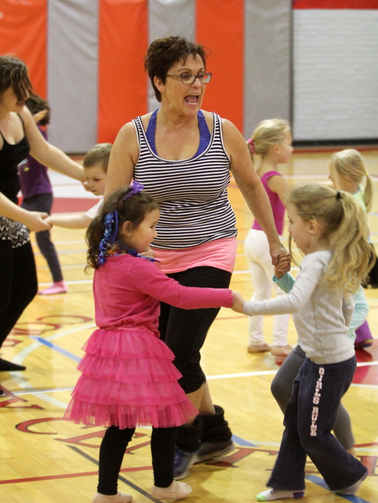 Farmington Postmaster Sue Jones leads a dance rehearsal at the Farmington Community Center on Saturday. This will mark the second year Jones has directed a free show in Farmington which will take place at the Farmington Community Center on Dec. 6 at 4 p.m. followed by a smaller second production at North Street Church at 6 p.m.