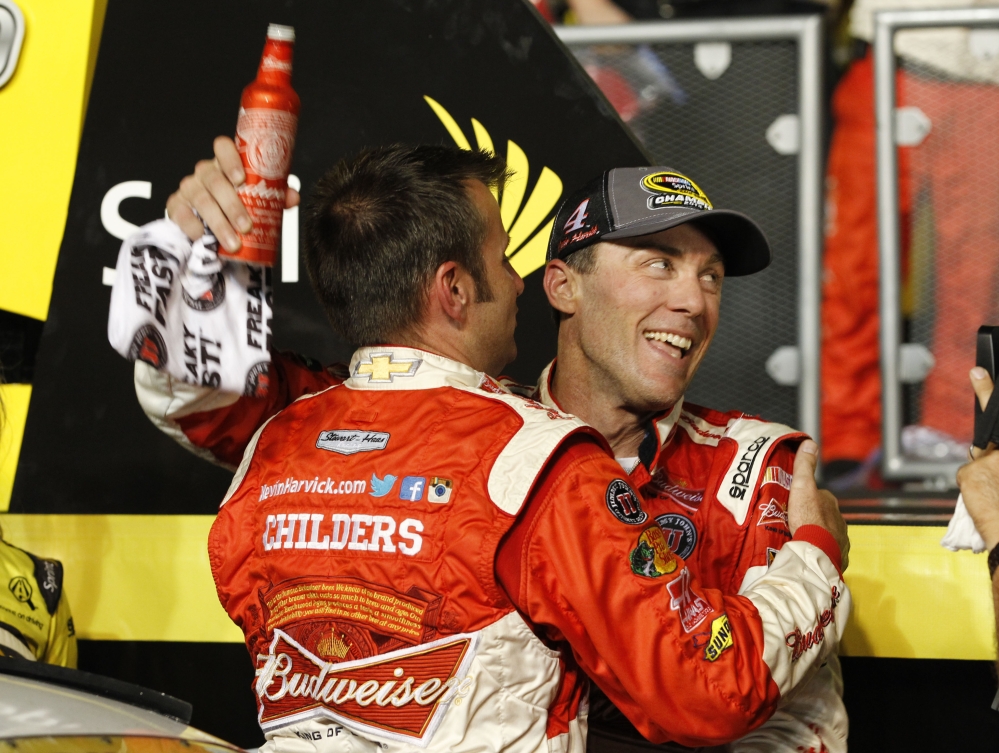 Kevin Harvick celebrates winning the NASCAR Sprint Cup championship Sunday in Homestead, Fla.