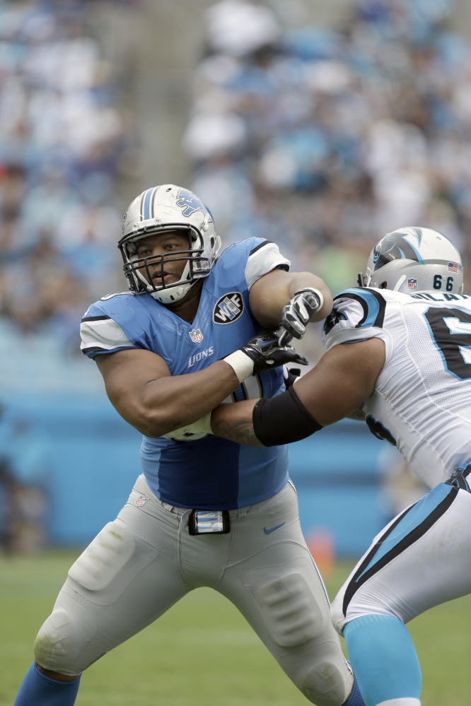 Detroit Lions’ Ndamukong Suh (90) rushes towards Carolina Panthers’ Amini Silatolu (66) during the second half Sunday in Charlotte, N.C. The Lions play the New England Patriots on Sunday in Foxborough, Mass.