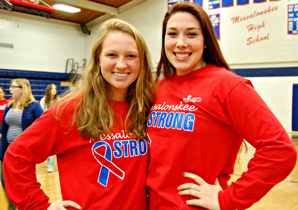 Messalonskee High School students Camille Fontaine, left, and Sydni Collier wear “Messalonskee Strong” shirts. In the wake of a hayride accident that claimed the life of their fellow student, 17-year-old Cassidy Charette, the junior class began selling the shirts as a fundraiser with proceeds going to a scholarship fund started in Charette’s honor.