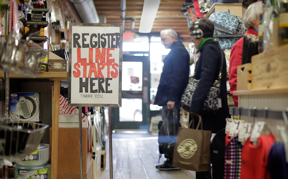 Shoppers browse on Black Friday in 2013 at LeRoux Kitchen on Commercial Street in Portland.